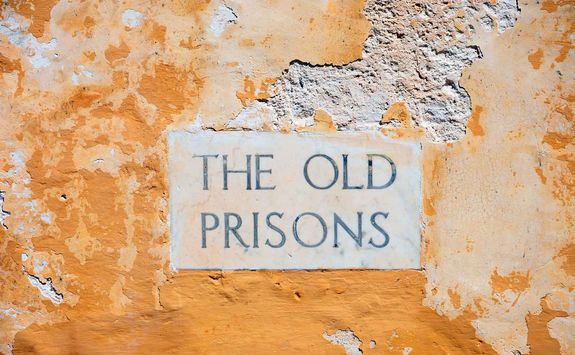 old prison sign
