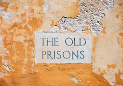 old prison sign