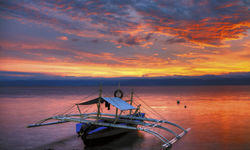 Boat at sunset, Moalboal