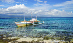 Boat by the shore, Apo Island