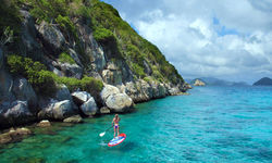 Paddleboarder on a diving holiday