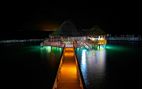 Thatch Caye pontoon at night 