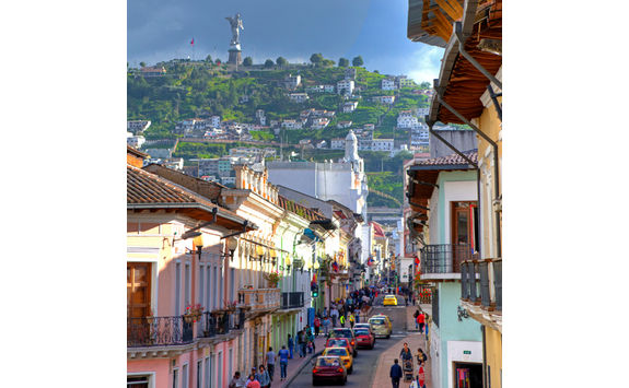 quito colourful street and mountain