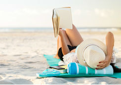 Reading a book on the beach