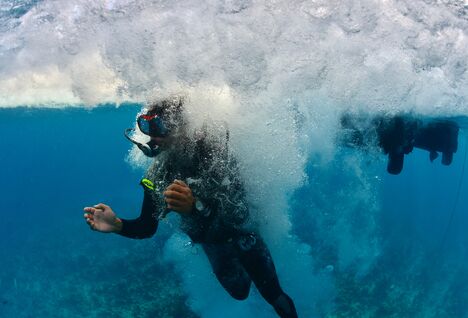 Diver entering the water