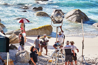 film set on the shore of a blue beach 