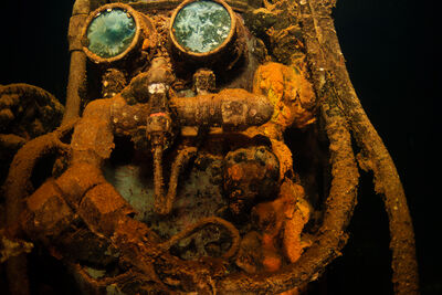 underwater photo of a mask from a wreck in Micronesia