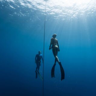 Two free divers underwater