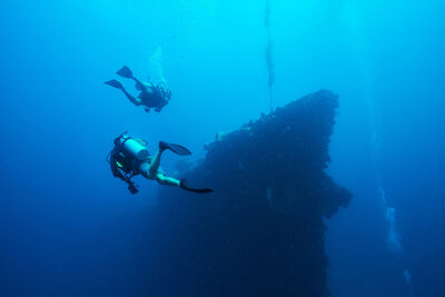 Divers at a wreck in Micronesia